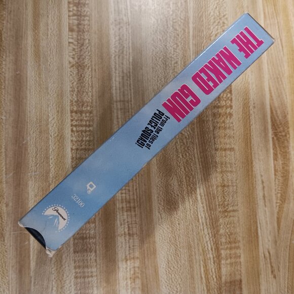 The Naked Gun VHS 1988 Leslie Nielsen Zucker Priscilla Presley Weird Al OJ VTG - Picture 4 of 8